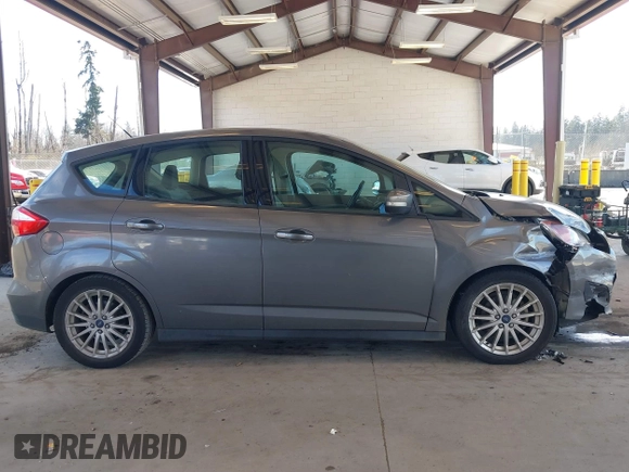 2013 Ford C-Max SE z VIN 1FADP5AU4DL556432, wystawiony jako IAAI lot #41703080 z przebiegiem 147 693 mil mil oraz . Historia ofert i sprzedaży dostępna na DreamBid. Obrazek 13.
