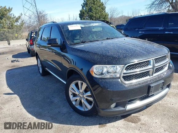 2013 Dodge Durango Crew z VIN 1C4RDJDG9DC677142, wystawiony jako IAAI lot #41834251 z przebiegiem 138 307 mil mil oraz . Historia ofert i sprzedaży dostępna na DreamBid. Obrazek 1.