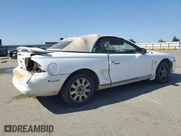1998 Ford Mustang with VIN 1FAFP4448WF269580, listed as a Copart auction lot 54861155 with 304,869 mi miles and Salvage title. Bid and sale history available at DreamBid. Image 3.