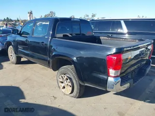 2017 Toyota Tacoma SR with VIN 5TFAX5GN5HX095074, listed as a IAAI auction lot 41814654 with 120,782 mi miles. Bid and sale history available at carsss.com. Image 3.