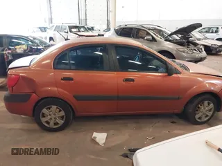 2009 Kia Rio LX with VIN KNADE223796547229, listed as a IAAI auction lot 41947371 with 153,061 mi miles and . Bid and sale history available at DreamBid. Image 13.