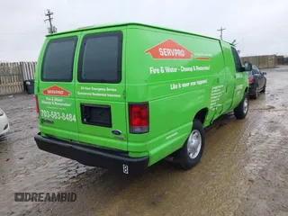 2012 Ford Econoline Cargo Commercial with VIN 1FTNS2EWXCDA43833, listed as a IAAI auction lot 41335268 with 181,390 mi miles. Bid and sale history available at carsss.com. Image 4.