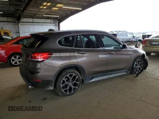 2020 BMW X1 xDrive28i with VIN WBXJG9C05L5R40935, listed as a Copart auction lot 47145335 with 46,554 mi miles and Salvage Title. Bid and sale history available at carsss.com. Image 3.