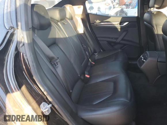 2019 Maserati Ghibli z VIN ZAM57XSA3K1325881, wystawiony jako Copart lot #80973694 z przebiegiem 64 189 mil mil oraz Szkoda całkowita • Salvage title. Historia ofert i sprzedaży dostępna na DreamBid. Obrazek 10.