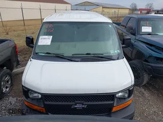 2014 Chevrolet Express Cargo Van with VIN 1GCWGFCA2E1148147, listed as a IAAI auction lot 41101132 with 110,648 mi miles. Bid and sale history available at carsss.com. Image 11.