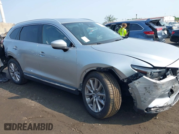 2020 Mazda CX-9 Grand Touring with VIN JM3TCBDY6L0424584, listed as a IAAI auction lot 42473920 with 32,385 mi miles and . Bid and sale history available at DreamBid. Image 6.