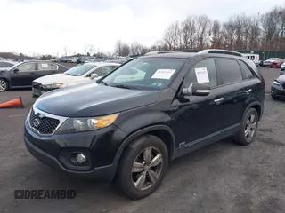 2013 Kia Sorento EX with VIN 5XYKUDA27DG413537, listed as a IAAI auction lot 40991803 with 163,534 mi miles. Bid and sale history available at carsss.com. Image 2.