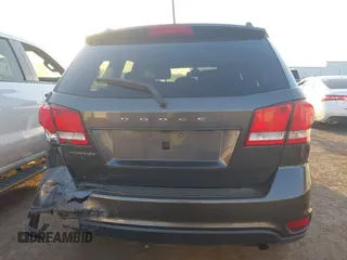 2019 Dodge Journey SE z VIN 3C4PDCBB8KT858387, wystawiony jako IAAI lot #42051620 z przebiegiem 76 126 mil mil oraz . Historia ofert i sprzedaży dostępna na DreamBid. Obrazek 16.