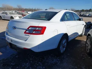 2018 Ford Taurus SE with VIN 1FAHP2D85JG127853, listed as a IAAI auction lot 41596548 with 128,087 mi miles. Bid and sale history available at carsss.com. Image 4.
