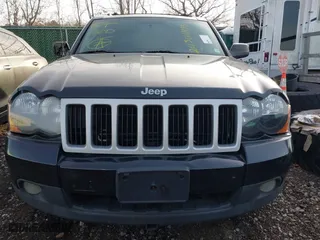 2009 Jeep Grand Cherokee Laredo with VIN 1J8GR48K29C552248, listed as a IAAI auction lot 41209184 with 194,778 mi miles. Bid and sale history available at carsss.com. Image 6.