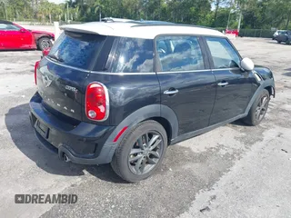 2013 MINI Countryman S z VIN WMWZC3C5XDWP24270, wystawiony jako IAAI lot #42232550 z przebiegiem 95 512 mil mil oraz . Historia ofert i sprzedaży dostępna na DreamBid. Obrazek 4.
