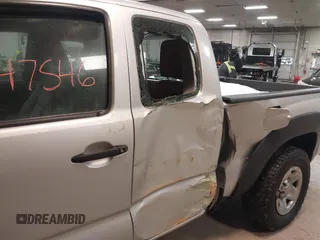 2013 Toyota Tacoma with VIN 5TFUU4EN0DX071116, listed as a IAAI auction lot 41647546 with 243,898 mi miles and . Bid and sale history available at DreamBid. Image 6.