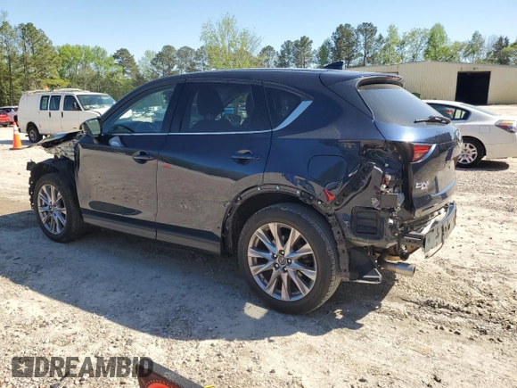 2019 Mazda CX-5 Grand Touring with VIN JM3KFBDMXK0540725, listed as a Copart auction lot 52395185 with 33,838 mi miles and Salvage Title. Bid and sale history available at carsss.com. Image 2.