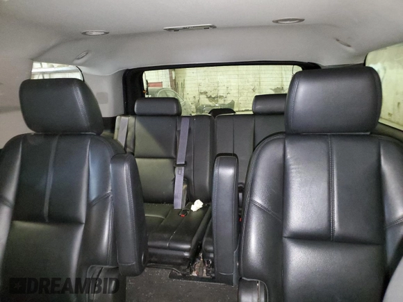 2013 Chevrolet Tahoe LT with VIN 1GNSKBE01DR288157, listed as a Copart auction lot 52665075 with 152,068 mi miles and Salvage Title. Bid and sale history available at DreamBid. Image 10.