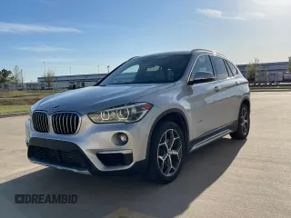 2017 BMW X1 sDrive28i with VIN WBXHU7C39H5H34971, listed as a Copart auction lot 51869265 with 108,051 mi miles and Clean Title. Bid and sale history available at carsss.com. Image 2.