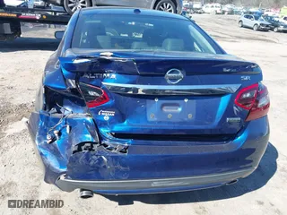 2018 Nissan Altima 2.5 SL with VIN 1N4AL3AP1JC294068, listed as a IAAI auction lot 41639471 with 100,772 mi miles. Bid and sale history available at carsss.com. Image 16.