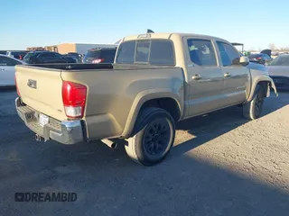 2017 Toyota Tacoma SR5 z VIN 5TFAZ5CN2HX039996, wystawiony jako IAAI lot #41406419 z przebiegiem 132 200 mil mil oraz . Historia ofert i sprzedaży dostępna na DreamBid. Obrazek 4.