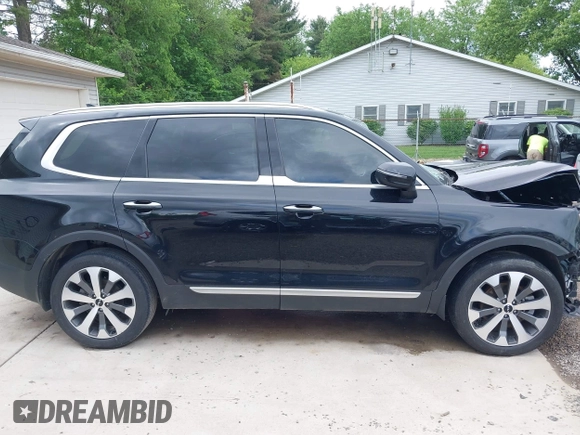 2022 Kia Telluride S with VIN 5XYP64HC6NG261279, listed as a IAAI auction lot 42240640 with 89,317 mi miles and . Bid and sale history available at DreamBid. Image 14.