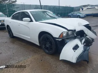 2014 Dodge Charger SXT with VIN 2C3CDXHG8EH262240, listed as a IAAI auction lot 40138392 with 116,705 mi miles. Bid and sale history available at carsss.com. Image 1.