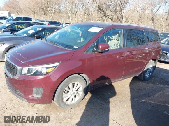 2016 Kia Sedona LX with VIN KNDMB5C15G6210016, listed as a IAAI auction lot 41756846 with 106,511 mi miles. Bid and sale history available at carsss.com. Image 2.