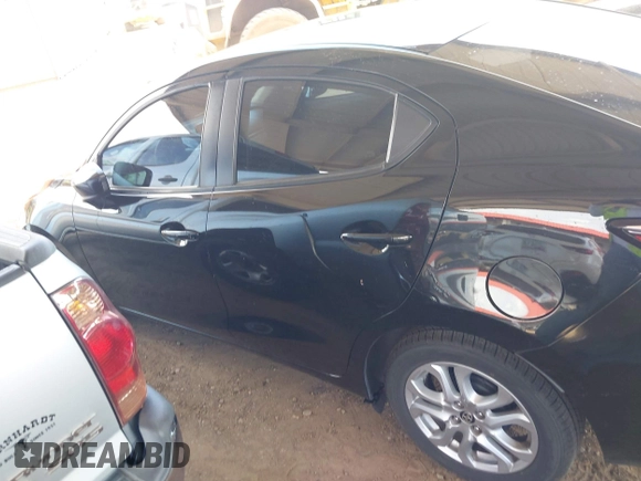 2016 Scion iA z VIN 3MYDLBZV2GY102744, wystawiony jako IAAI lot #42118048 z przebiegiem 128 772 mil mil oraz . Historia ofert i sprzedaży dostępna na DreamBid. Obrazek 14.