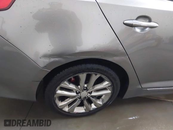 2014 Kia Optima SX Turbo with VIN 5XXGR4A61EG316334, listed as a IAAI auction lot 41684077 with 179,212 mi miles and . Bid and sale history available at DreamBid. Image 21.