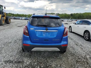 2017 Buick Encore Essence with VIN KL4CJCSB4HB058035, listed as a Copart auction lot 52089365 with 64,194 mi miles and Salvage Title. Bid and sale history available at carsss.com. Image 6.