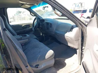 2000 Ford F-150 XL with VIN 1FTRX18L6YKB06492, listed as a IAAI auction lot 42058110 with 169,217 mi miles. Bid and sale history available at carsss.com. Image 5.