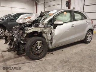 2013 Kia Rio LX with VIN KNADM5A31D6274318, listed as a IAAI auction lot 40986091 with 182,000 mi miles. Bid and sale history available at carsss.com. Image 2.