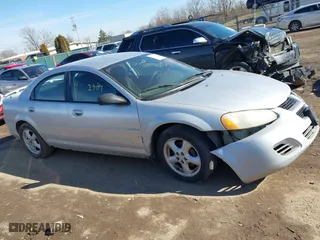 2004 Dodge Stratus SXT with VIN 1B3EL46X64N128617, listed as a IAAI auction lot 41584871 with 140,316 mi miles. Bid and sale history available at carsss.com. Image 13.