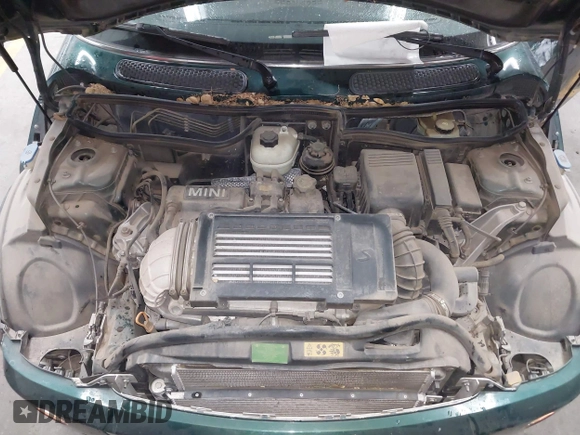2006 MINI Hardtop S z VIN WMWRE33536TJ40341, wystawiony jako IAAI lot #42637418 z przebiegiem 93 338 mil mil oraz . Historia ofert i sprzedaży dostępna na DreamBid. Obrazek 10.