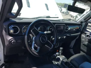 2021 Jeep Wrangler Unlimited Sahara z VIN 1C4HJXEN2MW528137, wystawiony jako IAAI lot #42134514 z przebiegiem 50 030 mil mil oraz . Historia ofert i sprzedaży dostępna na DreamBid. Obrazek 18.