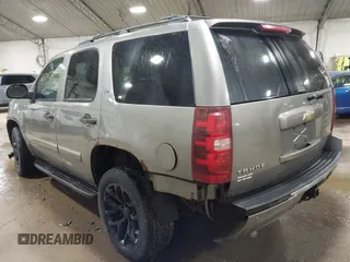2009 Chevrolet Tahoe LTZ with VIN 1GNFK33049R143390, listed as a IAAI auction lot 41747041 with 209,492 mi miles and . Bid and sale history available at DreamBid. Image 3.