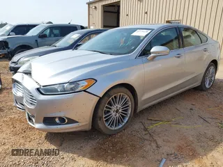 2014 Ford Fusion SE with VIN 3FA6P0H90ER344532, listed as a IAAI auction lot 41779138 with 170,042 mi miles and . Bid and sale history available at carsss.com. Image 2.
