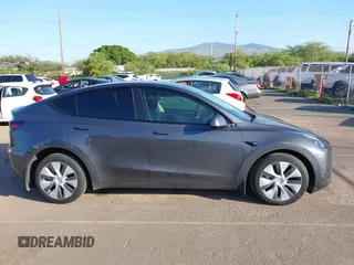 2023 Tesla Model Y Long Range with VIN 7SAYGDEE0PF928836, listed as a IAAI auction lot 41538742 with 9,630 mi miles and . Bid and sale history available at DreamBid. Image 13.