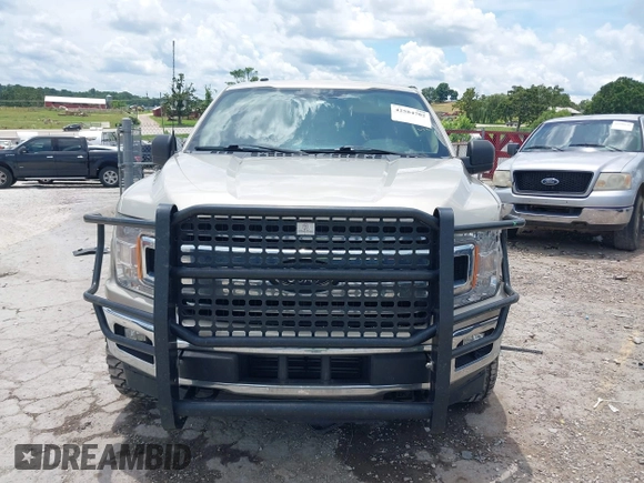 2018 Ford F-150 XL z VIN 1FTEW1EP3JKC46790, wystawiony jako IAAI lot #42584702 z przebiegiem 138 756 mil mil oraz . Historia ofert i sprzedaży dostępna na DreamBid. Obrazek 13.