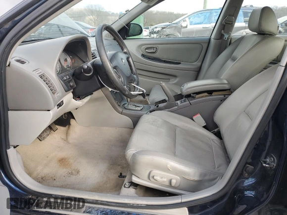 2003 Nissan Maxima SE z VIN JN1DA31A33T434264, wystawiony jako Copart lot #42189665 z przebiegiem 230 582 mil mil oraz Czysty tytuł • Clean title. Historia ofert i sprzedaży dostępna na DreamBid. Obrazek 7.