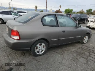 2001 Hyundai Accent GL with VIN KMHCG35C81U141661, listed as a Copart auction lot 84124804 with 38,318 mi miles and Clean Title. Bid and sale history available at carsss.com. Image 3.