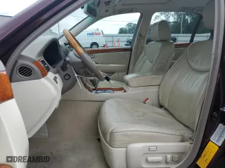 2002 Lexus LS 430 with VIN JTHBN30F720076834, listed as a Copart auction lot 61637384 with 129,217 mi miles and Salvage Title. Bid and sale history available at carsss.com. Image 7.