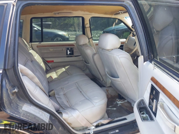1992 Lincoln Continental with VIN 1LNLM9749NY670102, listed as a IAAI auction lot 41968015 with Not Provided miles and . Bid and sale history available at DreamBid. Image 8.