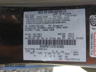 2007 Ford Fusion SE with VIN 3FAHP07157R142485, listed as a IAAI auction lot 42050207 with 150,263 mi miles. Bid and sale history available at carsss.com. Image 9.