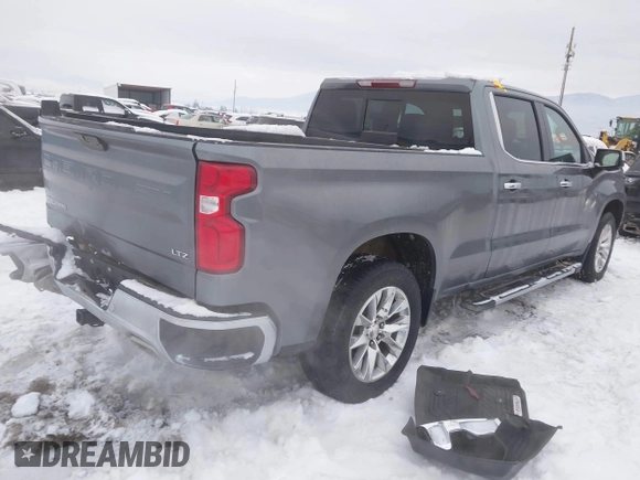 2021 Chevrolet Silverado 1500 LTZ with VIN 3GCUYGED9MG214517, listed as a IAAI auction lot 41296617 with 31,026 mi miles and . Bid and sale history available at DreamBid. Image 4.