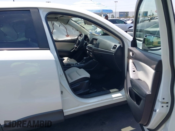 2016 Mazda CX-5 Grand Touring z VIN JM3KE2DY2G0824802, wystawiony jako IAAI lot #42170591 z przebiegiem 53 173 mil mil oraz . Historia ofert i sprzedaży dostępna na DreamBid. Obrazek 5.