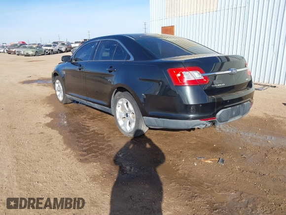 2011 Ford Taurus SEL with VIN 1FAHP2EW1BG177504, listed as a IAAI auction lot 41578564 with 243,855 mi miles. Bid and sale history available at carsss.com. Image 3.