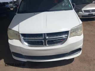 2012 Dodge Grand Caravan SE with VIN 2C4RDGBGXCR407641, listed as a IAAI auction lot 41950812 with 151,331 mi miles and . Bid and sale history available at DreamBid. Image 6.