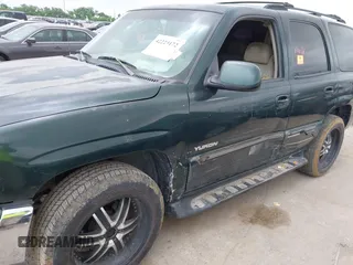 2002 GMC Yukon SLT z VIN 1GKEC13Z62R233154, wystawiony jako IAAI lot #42229172 z przebiegiem Nie podano mil oraz . Historia ofert i sprzedaży dostępna na DreamBid. Obrazek 6.