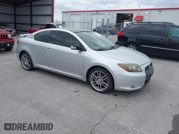 2009 Scion tC with VIN JTKDE167190282930, listed as a IAAI auction lot 42034538 with 198,964 mi miles. Bid and sale history available at carsss.com. Image 1.