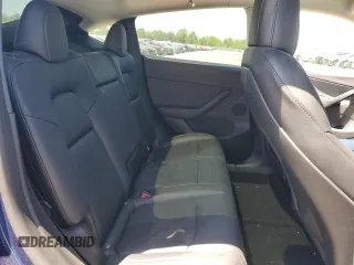 2022 Tesla Model Y Long Range z VIN 7SAYGDEEXNF444122, wystawiony jako Copart lot #54344735 z przebiegiem 33 230 mil mil oraz Szkody całkowita. Historia ofert i sprzedaży dostępna na DreamBid. Obrazek 10.