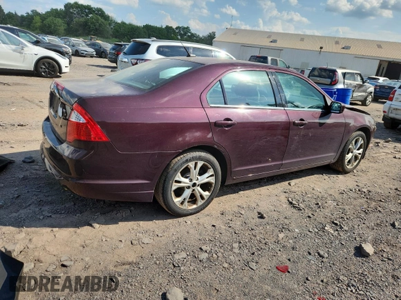 2012 Ford Fusion SE z VIN 3FAHP0HA7CR387524, wystawiony jako Copart lot #62083235 z przebiegiem 104 698 mil mil oraz Szkoda całkowita • Salvage title. Historia ofert i sprzedaży dostępna na DreamBid. Obrazek 3.