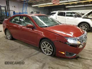 2010 Ford Fusion SEL with VIN 3FAHP0JA0AR239335, listed as a Copart auction lot 86290354 with 28,915 mi miles and Salvage Title. Bid and sale history available at DreamBid. Image 4.